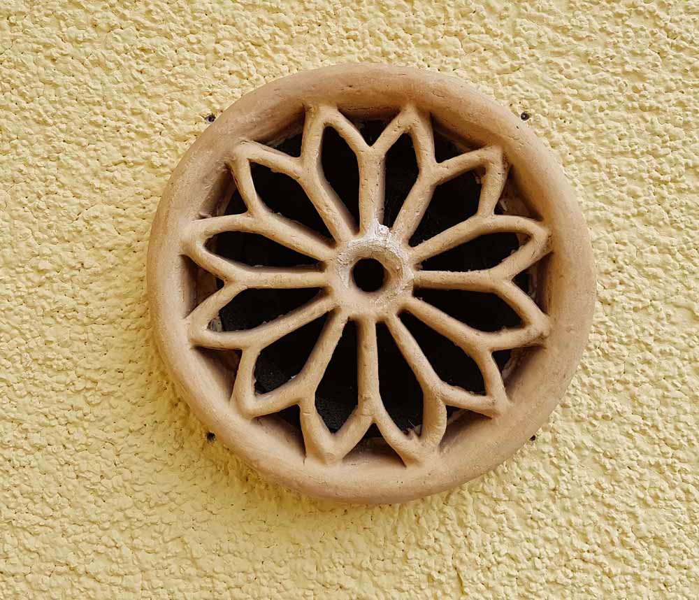 Wandornament als Mauerlfter